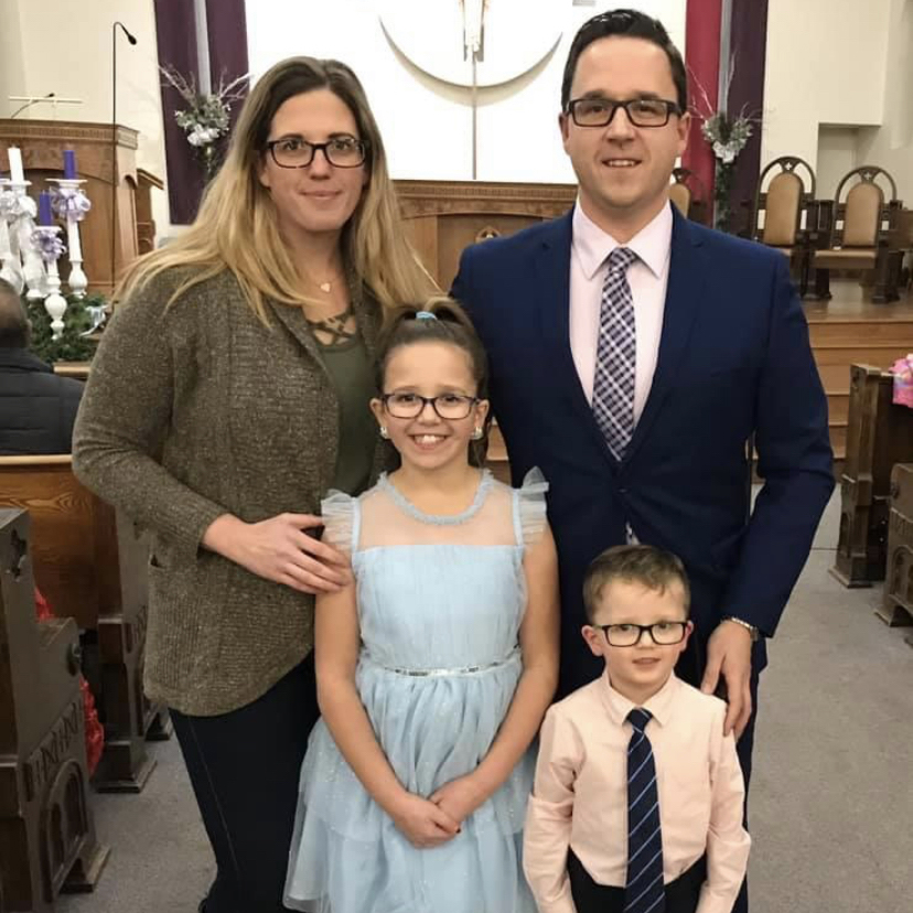 Mark Kay and wife Chantelle are pictured with their two children.