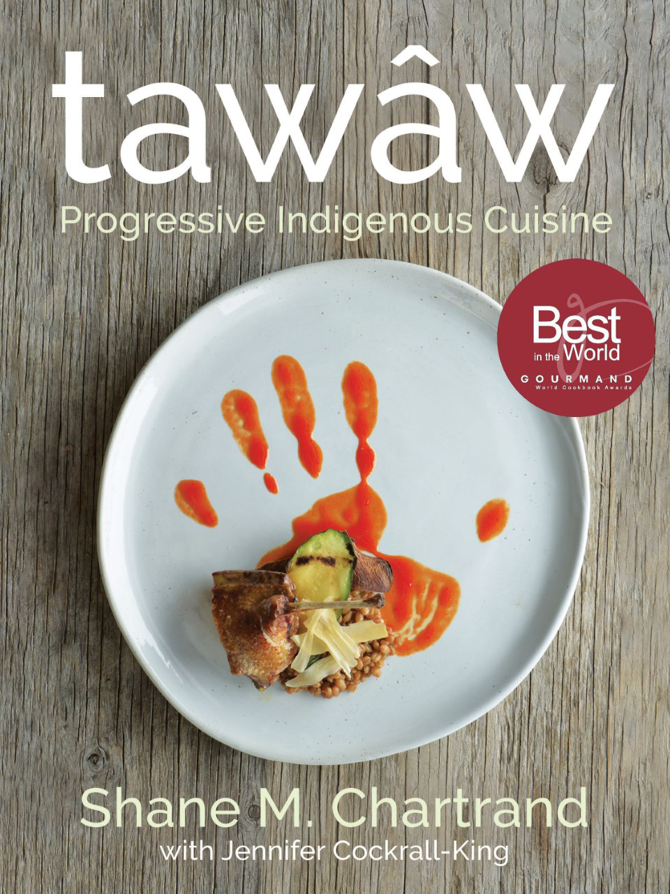 The cover of Chartrand's acclaimed book tataw shows one of the feature dishes on a white plate.