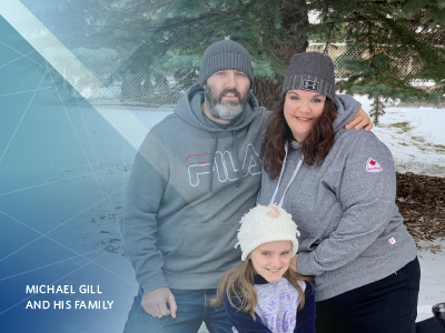 Scholarship recipient Michael Gill with his wife and daughter.