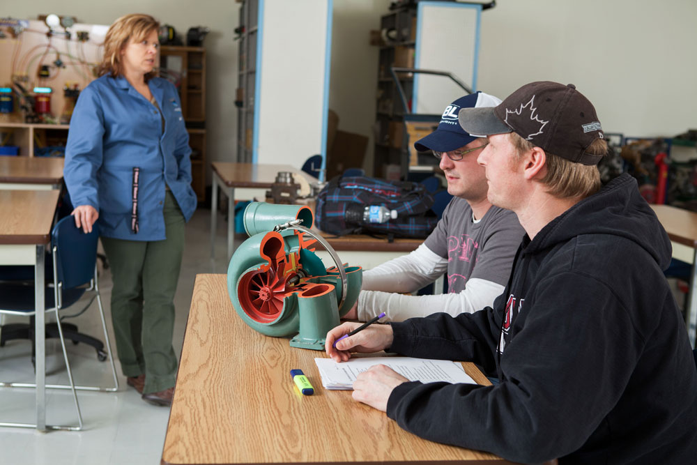 Parts Technician students with instructor