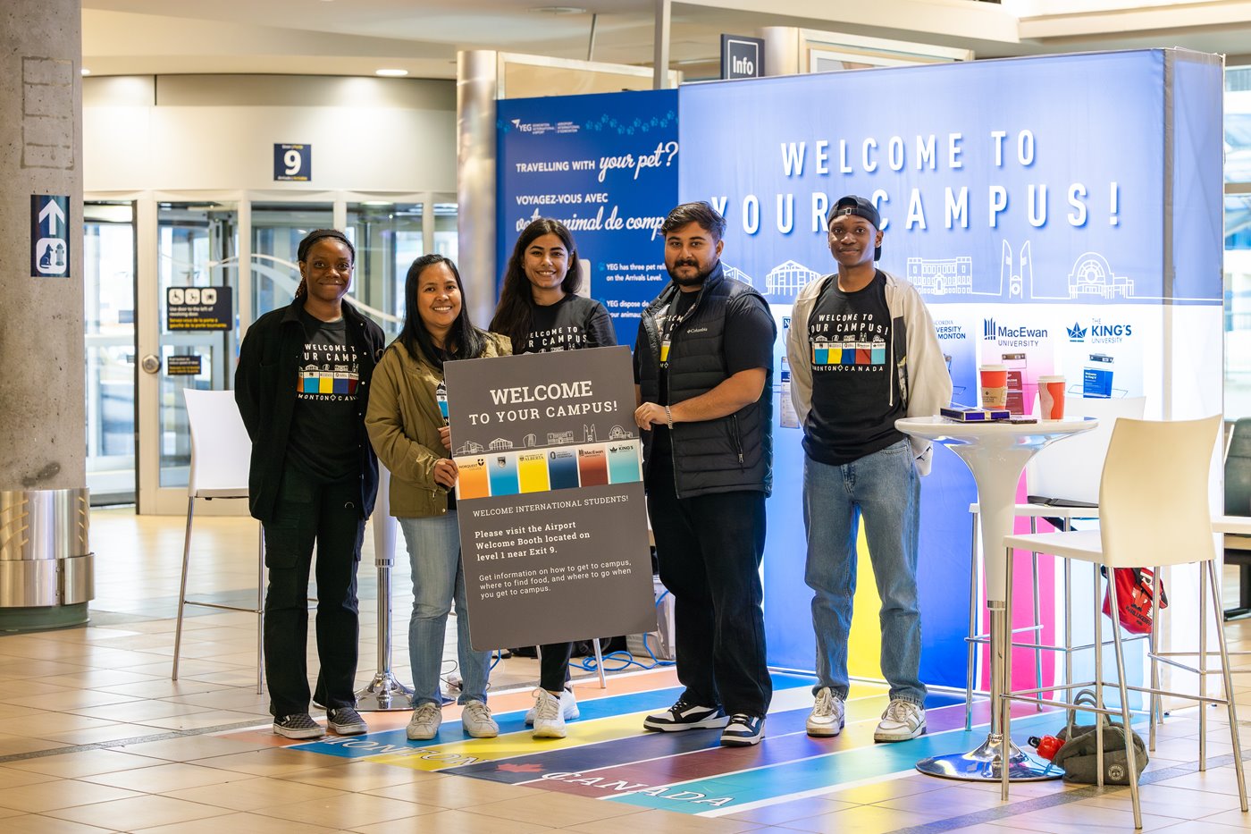 International students at airport welcoming