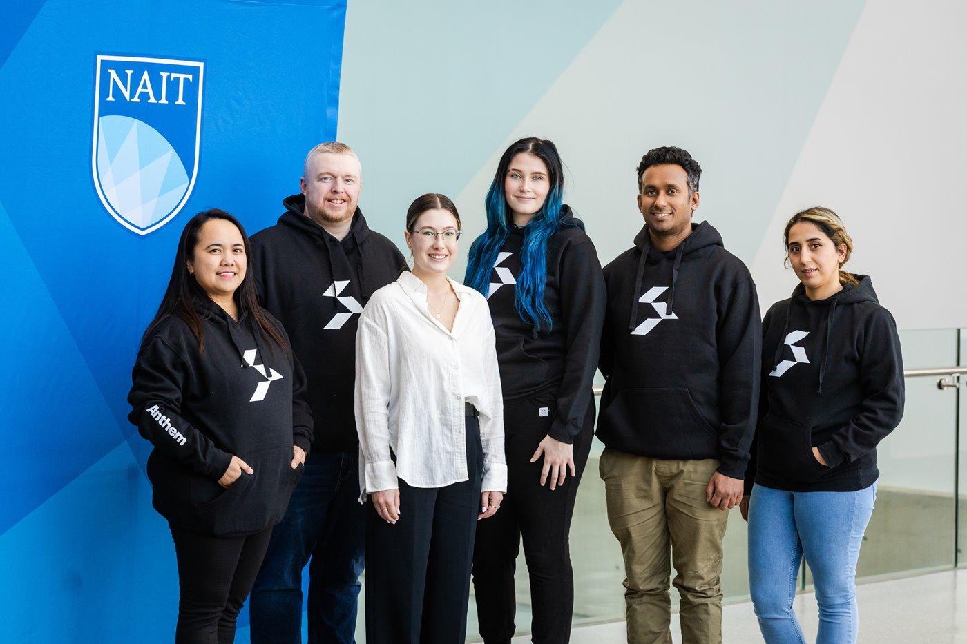 A photo of the recipients of the Anthem Properties scholarships in the Feltham Centre