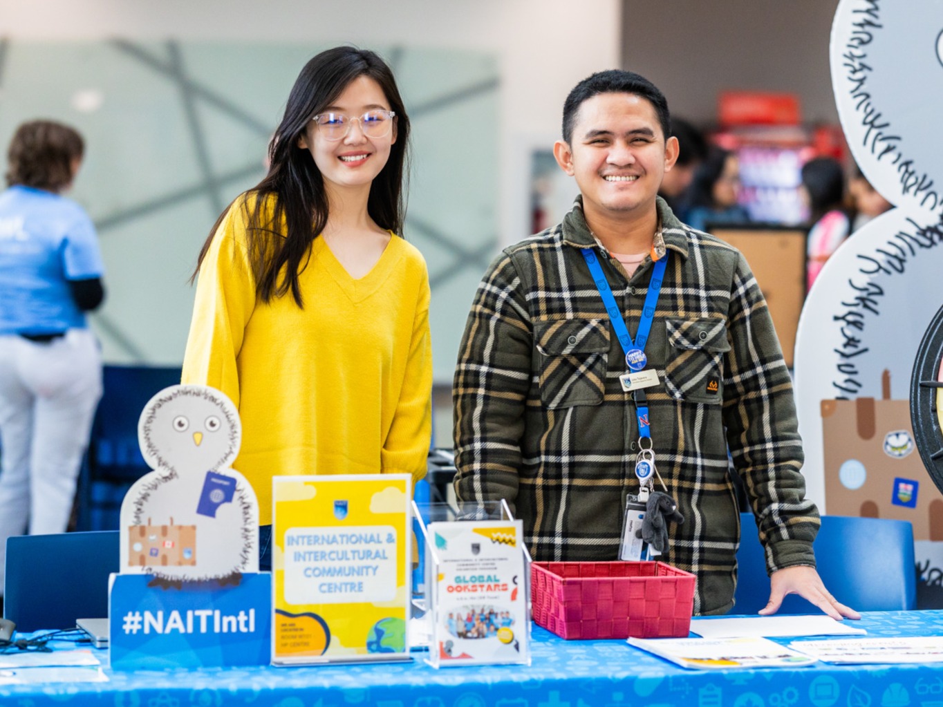 Asian Student and staff at Student Service Fair