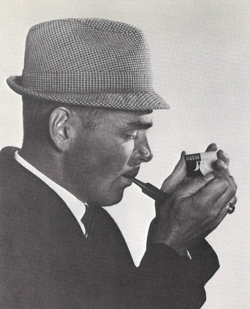 A yearbook photo of Garry Meadus wearing a fedora hat